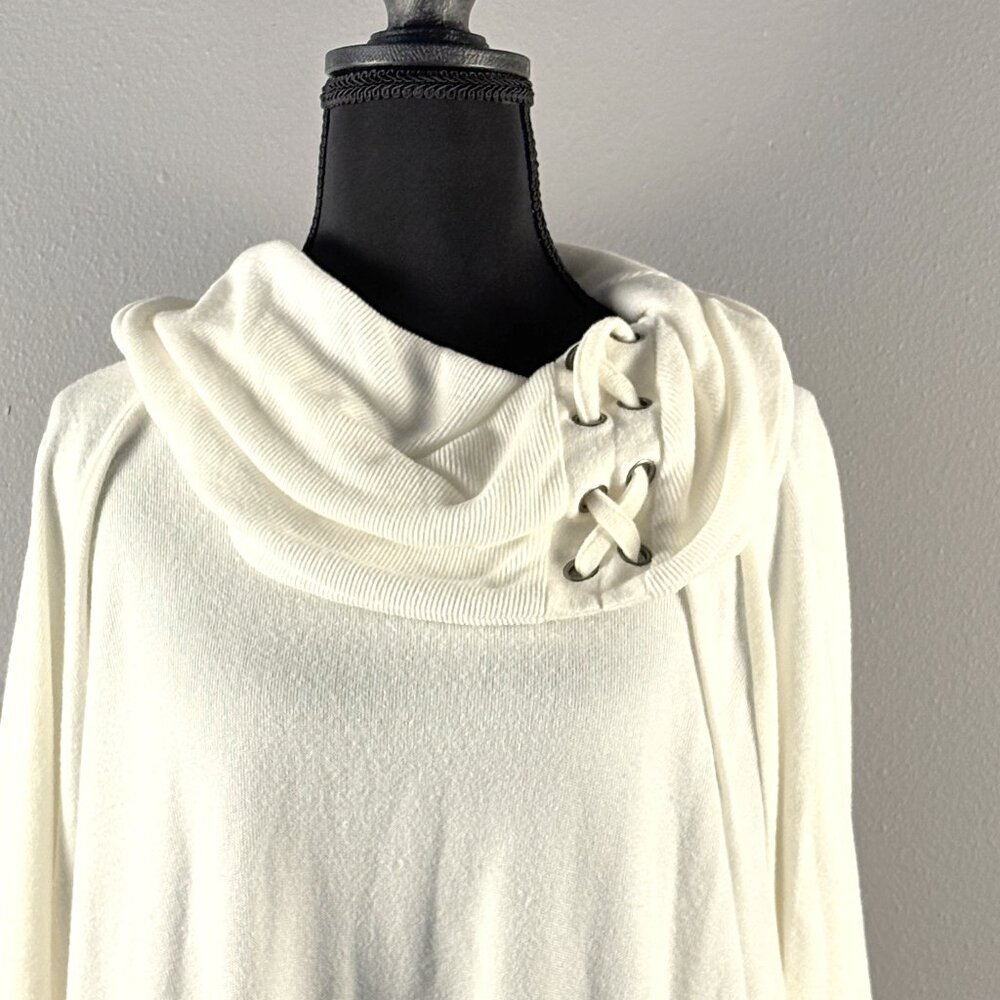 Sweater with shoelace type design